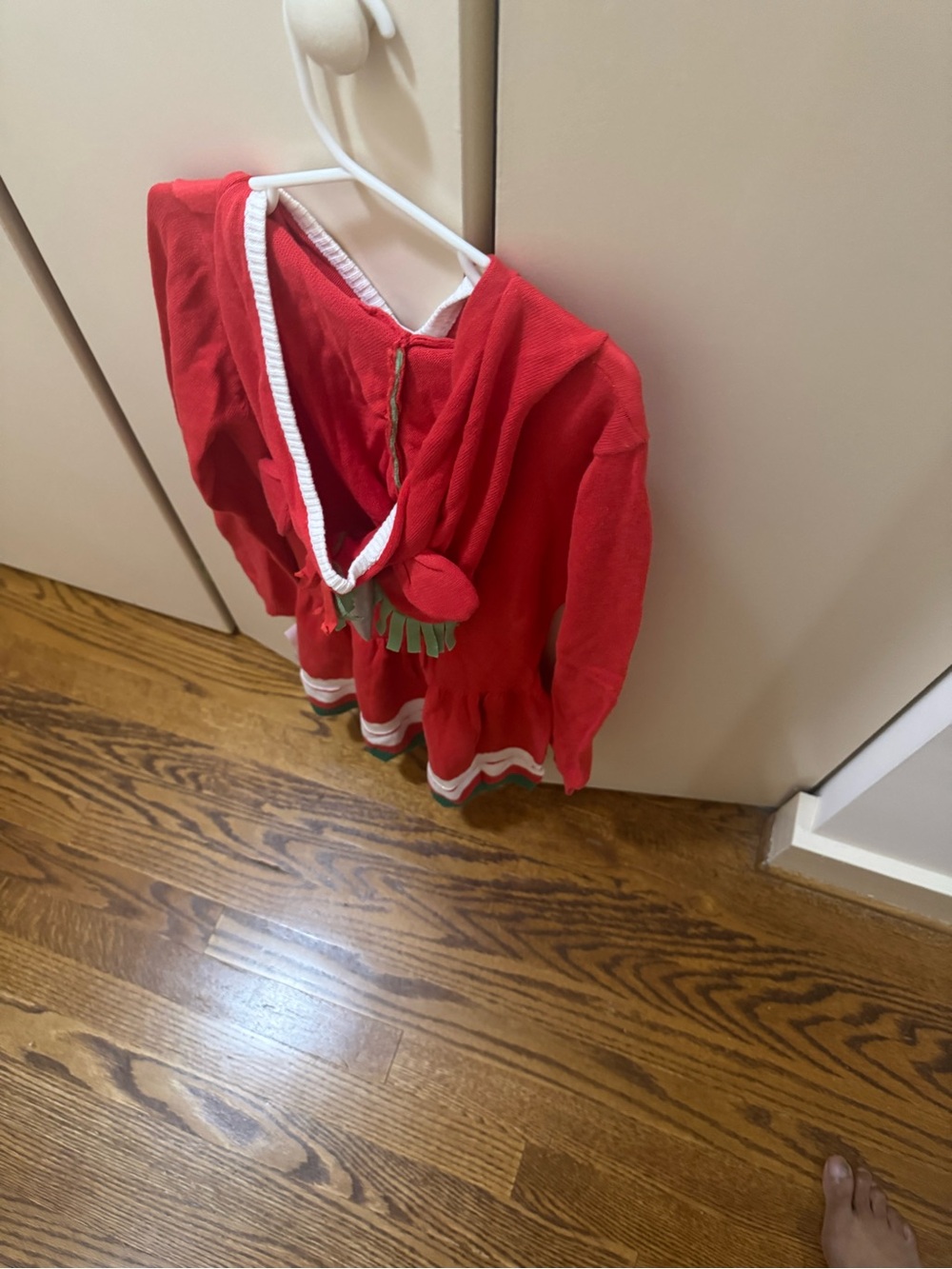 Girls Red Hooded Holiday Dress with Decorative Trim. Unicorn on front.